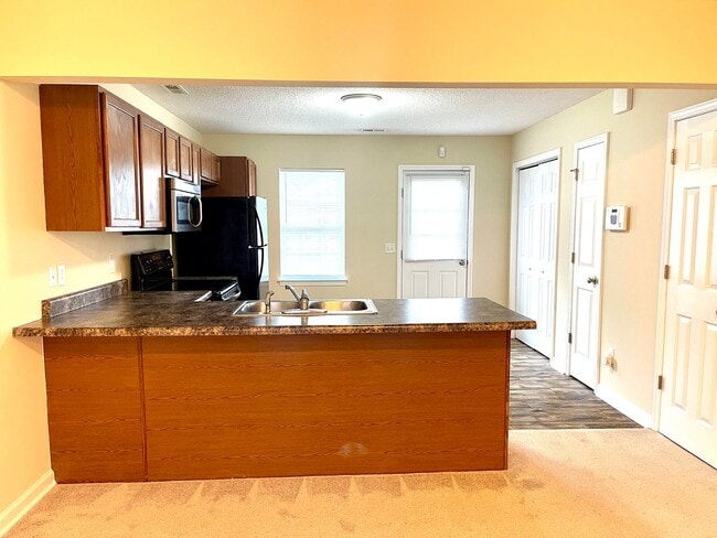 Photo - Charming 2BR Townhome Minutes from Hwy 172 Back Gate