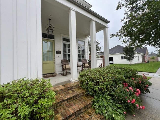 Photo - Luxury 4BR Home in Americana | 11 Ft Ceilings, Courtyard Living & Furnished Option