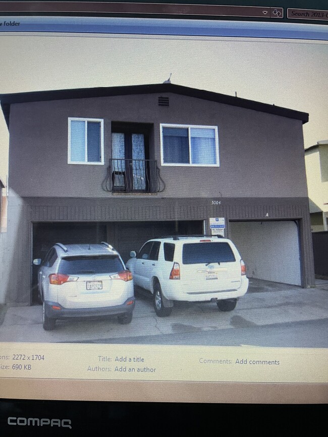 One car inside right garage, second car on pad - 5004 Seashore Dr Unit Newport Beach