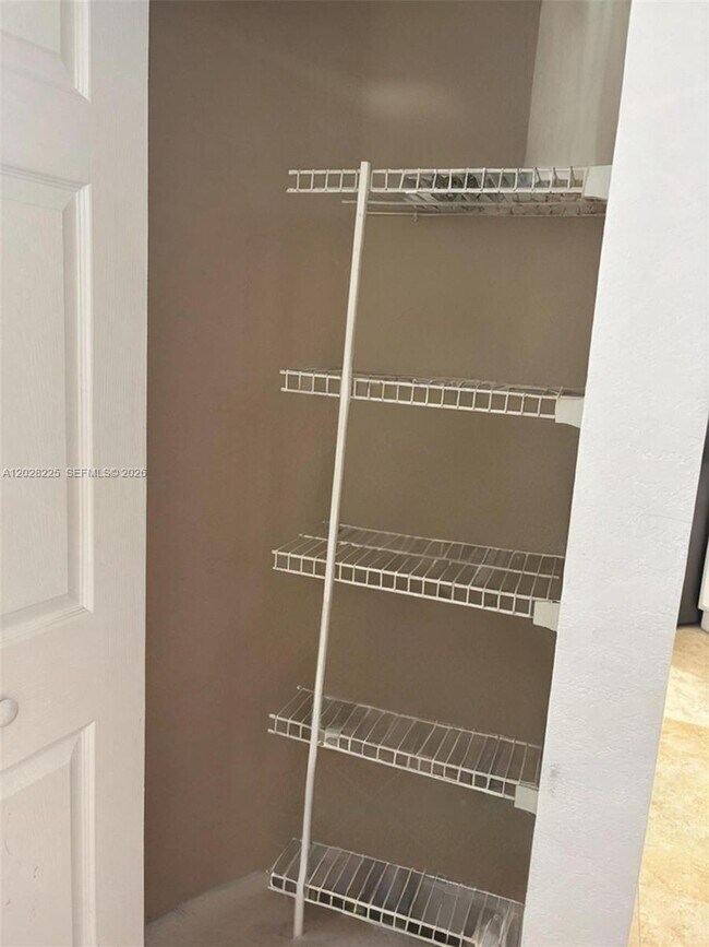 Photo - 8761 Wiles Rd Unidad 301