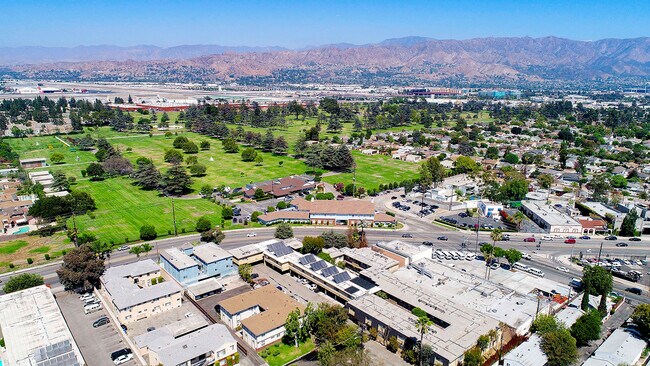 Aerial drone photo of 10620 NoHo and the surrounding community.