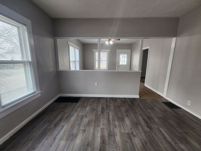 Photo - Charming 3-bedroom, 1-bath home with a bright living space, spacious bedrooms, and an easy-to-mai...