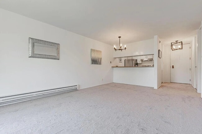 Building Photo - "Spacious 1-Bedroom Oasis with Hardwood Fl... Unit 100 Rental