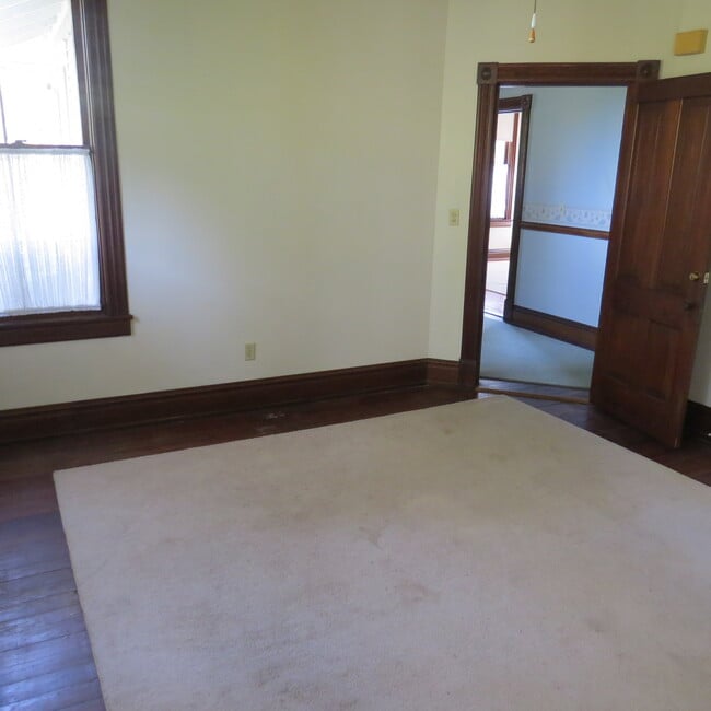 bedroom and door to hall - 711 Union St Unit 2