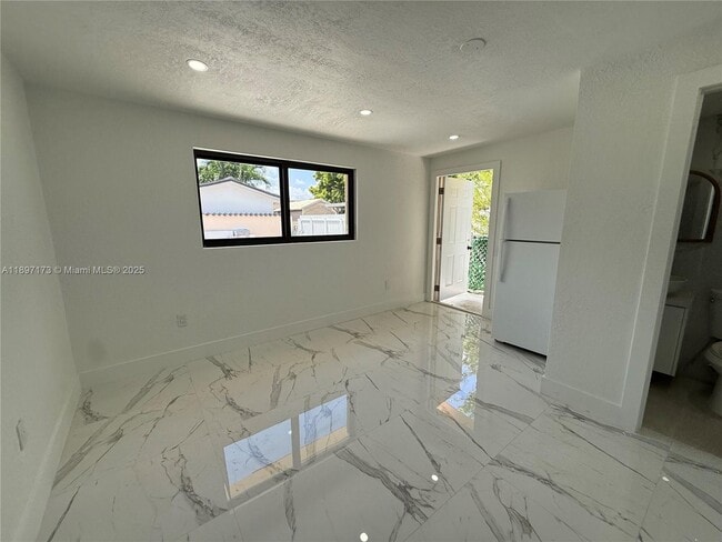 Building Photo - 9824 SW 26th Terrace Unit 1-2