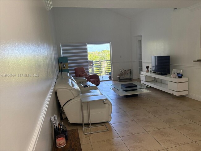 Building Photo - 9731 Fontainebleau Blvd Unit F310