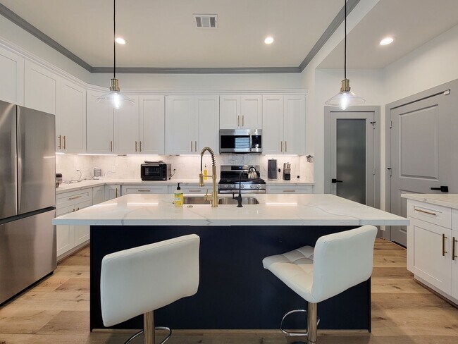 Photo - This 4-bedroom, 3-bathroom, two-story resi...