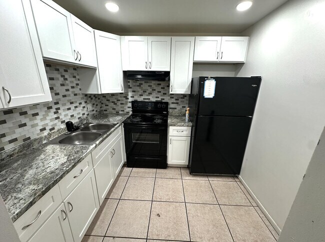 Building Photo - 6289 Lear Dr Unit 206 Rental