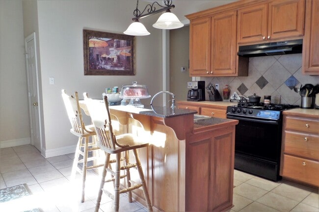 Photo - Location and upgrades! 3BR/2BA dbl garage, tons of storage, no carpet!