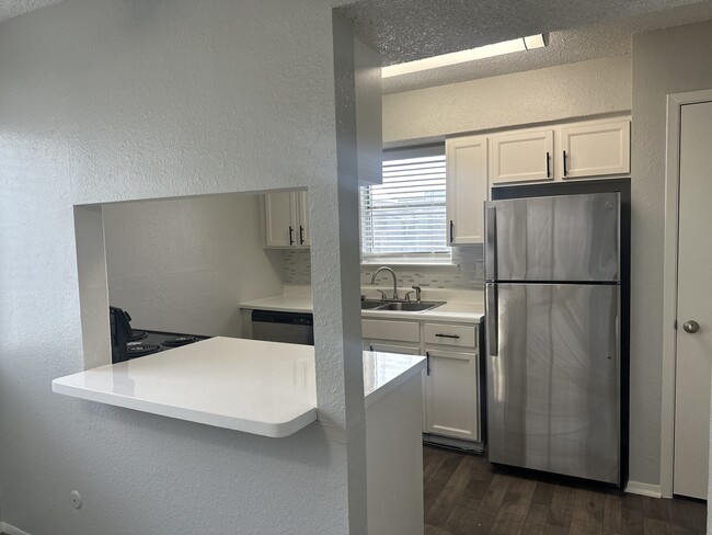 Chef Kitchen Open to Dining Area and Living Room - City West Rental