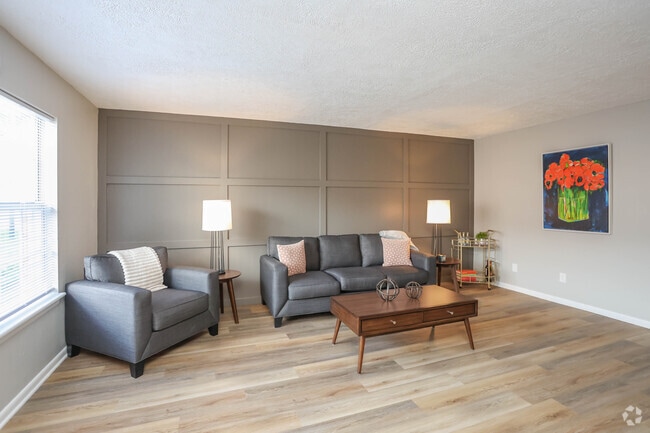 3BR, 2.5BA - 1,315SF - Living Room - Wynnwood at Freedom Road
