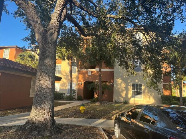 Building Photo - 5572 Metrowest Blvd Unit 5-209