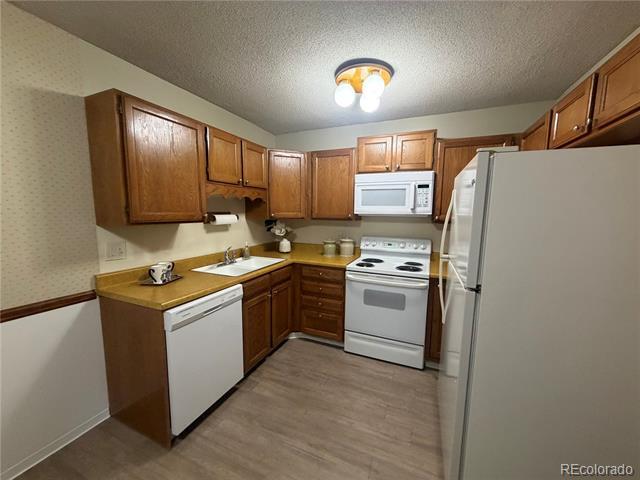 Building Photo - 3144 S Wheeling Way Unit 311