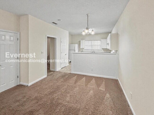 Photo - 3 Bed, 1.5 Bath Townhome with Fenced Yard / Pet-Friendly / Coming Soon!