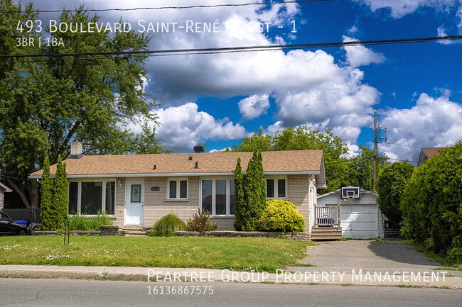 Building Photo - Spacious 3BR Bungalow with Private Yard & Parking –  493 St-René Blvd West, Gatineau