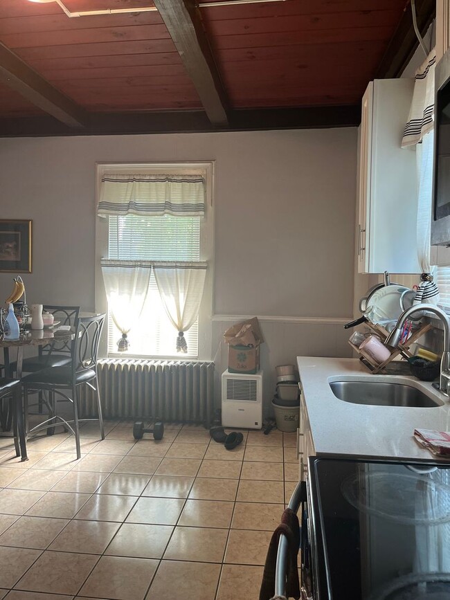 Photo - 2 Bed / 1 Bath First-Floor Rental – Available ASAP Unit 1