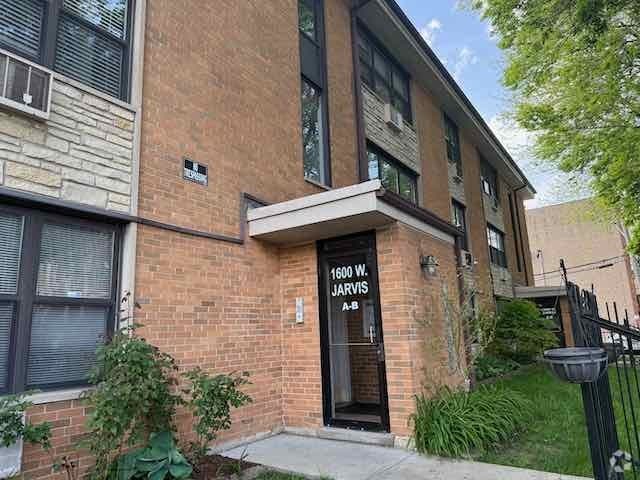 Building Photo - 1600 W Jarvis Ave Unit 3-A Rental