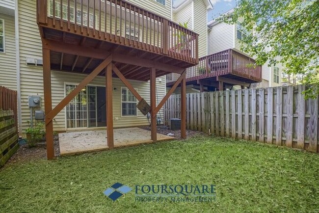 Photo - Lakefront Townhome with 1st Floor Bedroom, Fireplace & 2-Car Garage – In Raleigh
