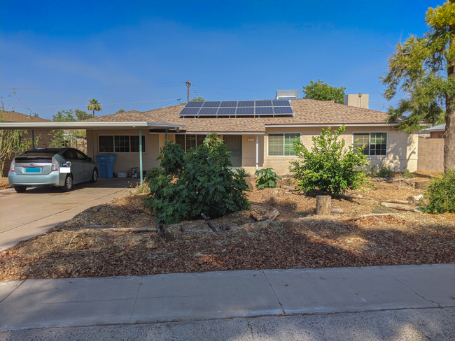 Two parking places protected by the elements - 5551 N 12th Ave