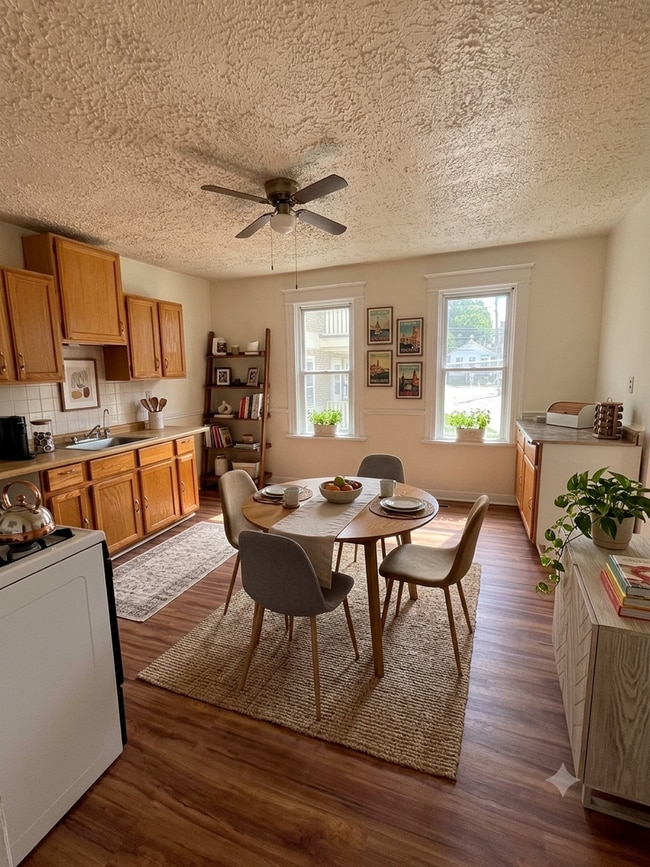 Building Photo - ? Steps from Brady St! Bright 2BR with FREE Laundry & Pet-Friendly Living Unit #1 Lower Front