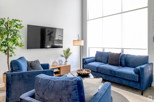 1BR, 1.5BA - 1002SF - Living Room - The George