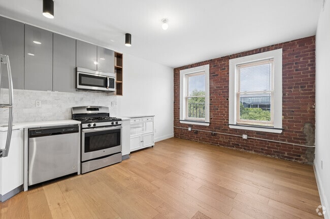 1BR, 1BA - 560SF - Kitchen and Living Room