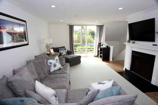 Living room w/ fireplace - 800 N Juanita Ave