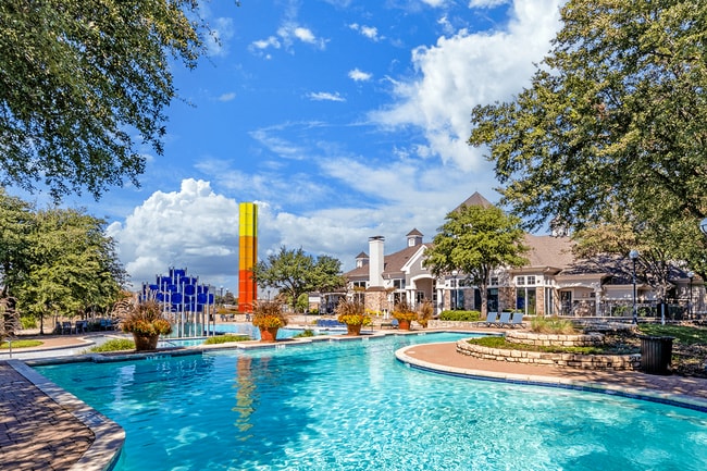 Beat the heat at our sparkling apartment pool - Grand Venetian at Las Colinas