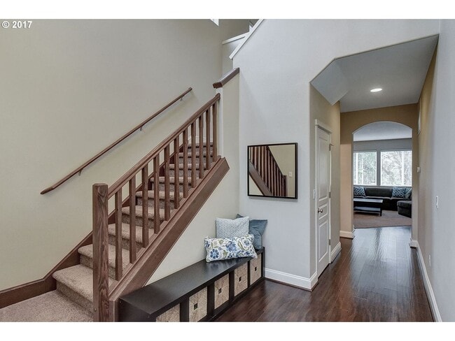 Photo - Bright and Open Floor Plan with Fireplace, Attached Garage & Vaulted Ceilings