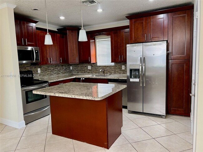 Photo - 10560 NW 57th Ct