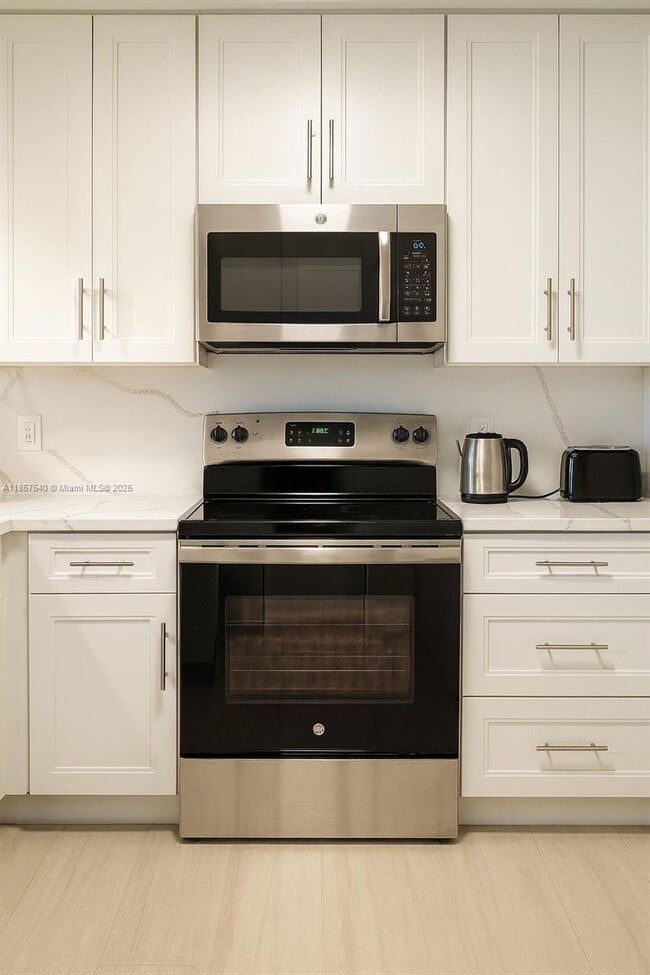 Building Photo - 10501 W Broward Blvd Unit 303