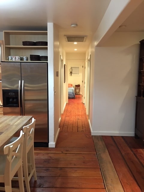 Hallway view from kitchen/dining area.