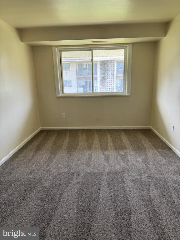 Building Photo - 5460 85th Ave Unit 202