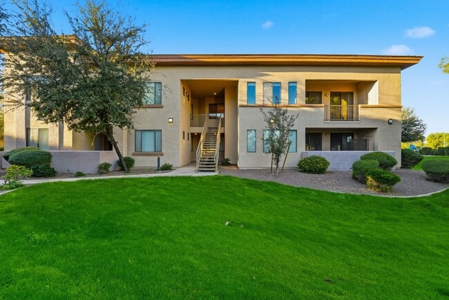 Building Photo - Luxury Gated Condo with Split Floorplan & Walk-In Closets