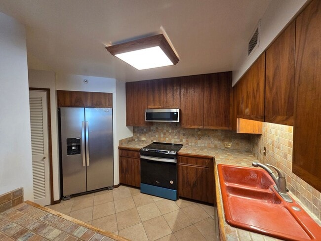 Photo - Rarely available 1-bedroom, 1-bathroom luxury apartment in the Punahou Cliffs Condominium.