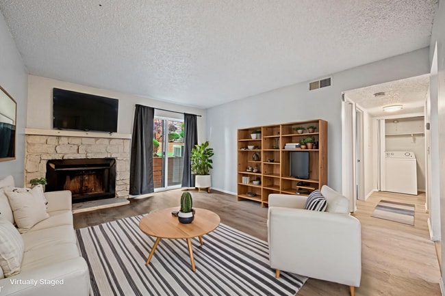 Photo - Updated 1 Bed Condo | Reserved Parking, Covered Patio & Fireplace Unit 129