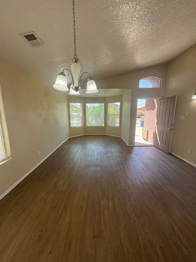 Photo - 4 bed 2 bath home! Fresh New Paint & Flooring Throughout
