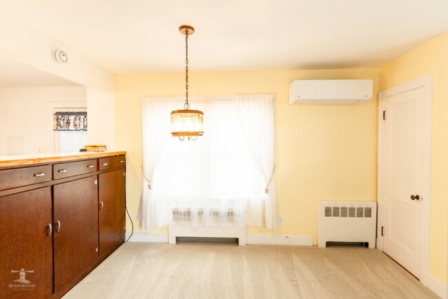 Photo - Charming 3BR South Portland Single-Family Home | Sunroom, Garage, Basement Storage & Spacious Yard