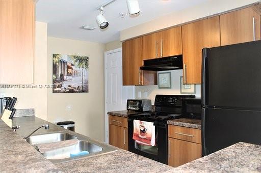 Building Photo - 5820 W Sample Rd Unit 105 Rental