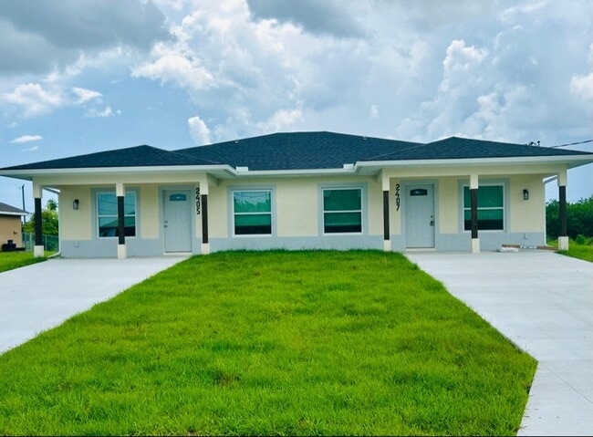 Building Photo - 2409-2411 Churchill Ave N