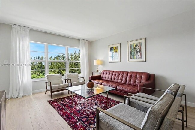Building Photo - 3150 N Palm Aire Dr Unit 705
