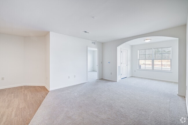 3BR, 2BA - 1,265SF - Living Room - The Coves at Monticello