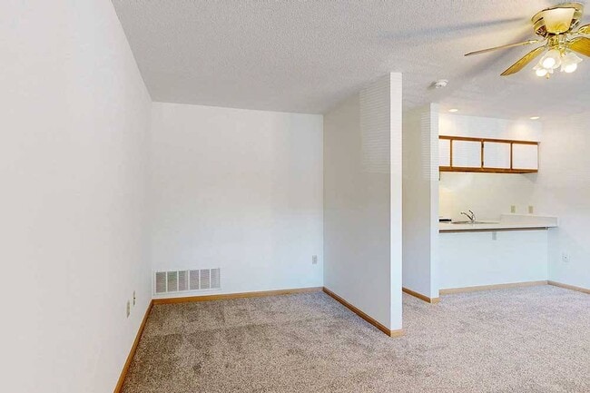 Relax, recharge, and make it your own with this open-concept living and sleeping area designed for easy living in our Bonsai studio. - Highland View Apartments