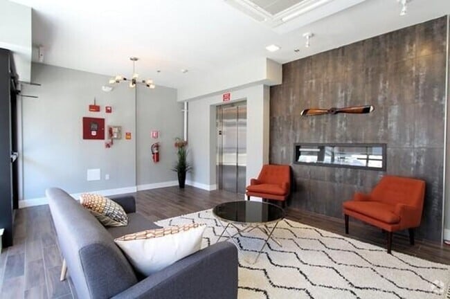 Building Photo - Room Available in Modern 2BR Condo – Jeffr...