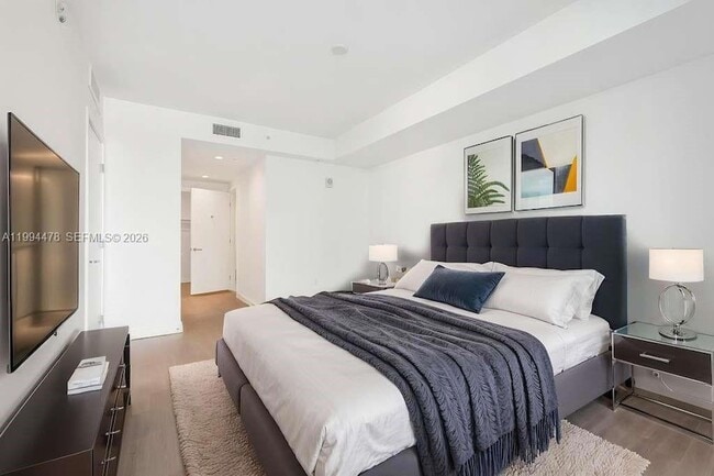 Building Photo - 9221 E Bay Harbor Dr Unit 210