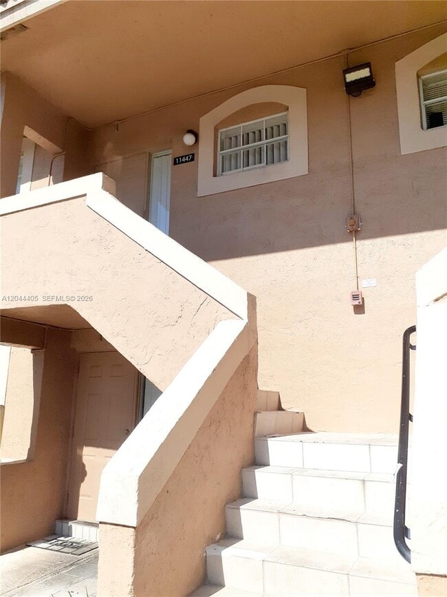 Building Photo - 11447 NW 42nd St Unit 11447