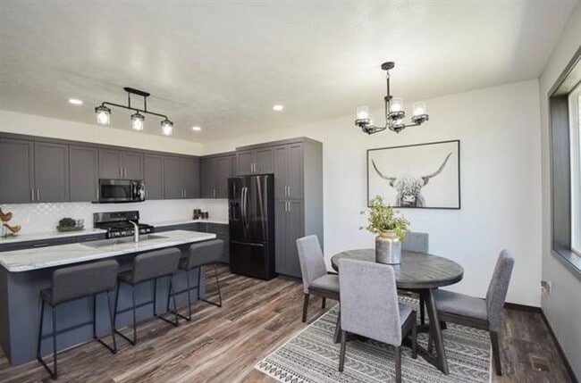 Photo - Spacious 4-Bedroom Ranch Home with Finished Basement & Oversized Garage!