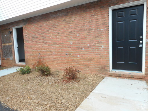 Building Photo - Townhouse-Two Bedroom One & Half Bathrooms...