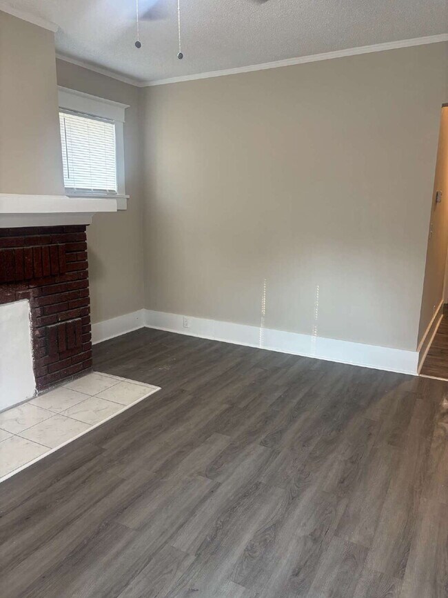 "Charming 3-Bedroom Home with Gleaming Hardwood Floors in Vibrant Memphis Neighborhood!"