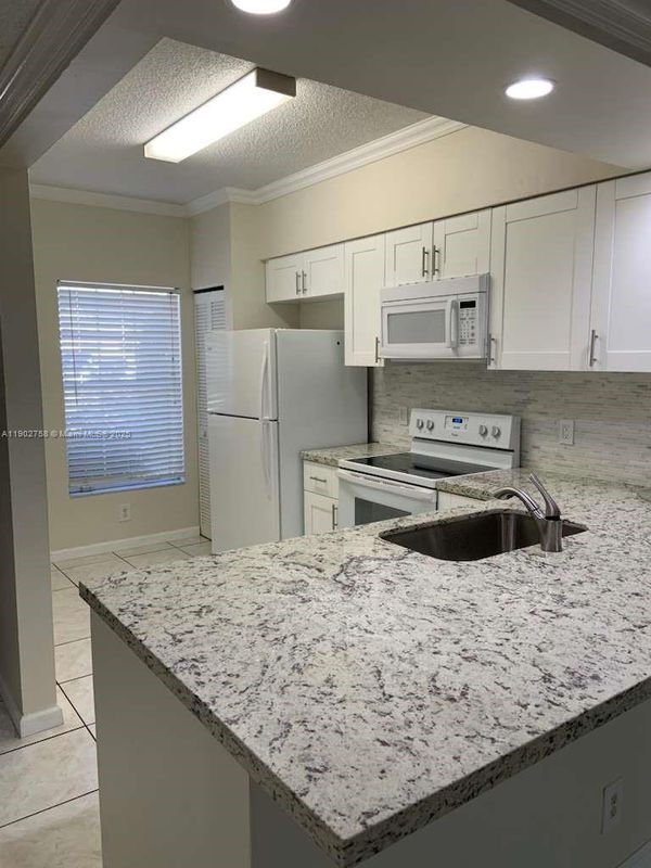 Photo - 21 Fleming Ct Unidad TOWNHOUSE